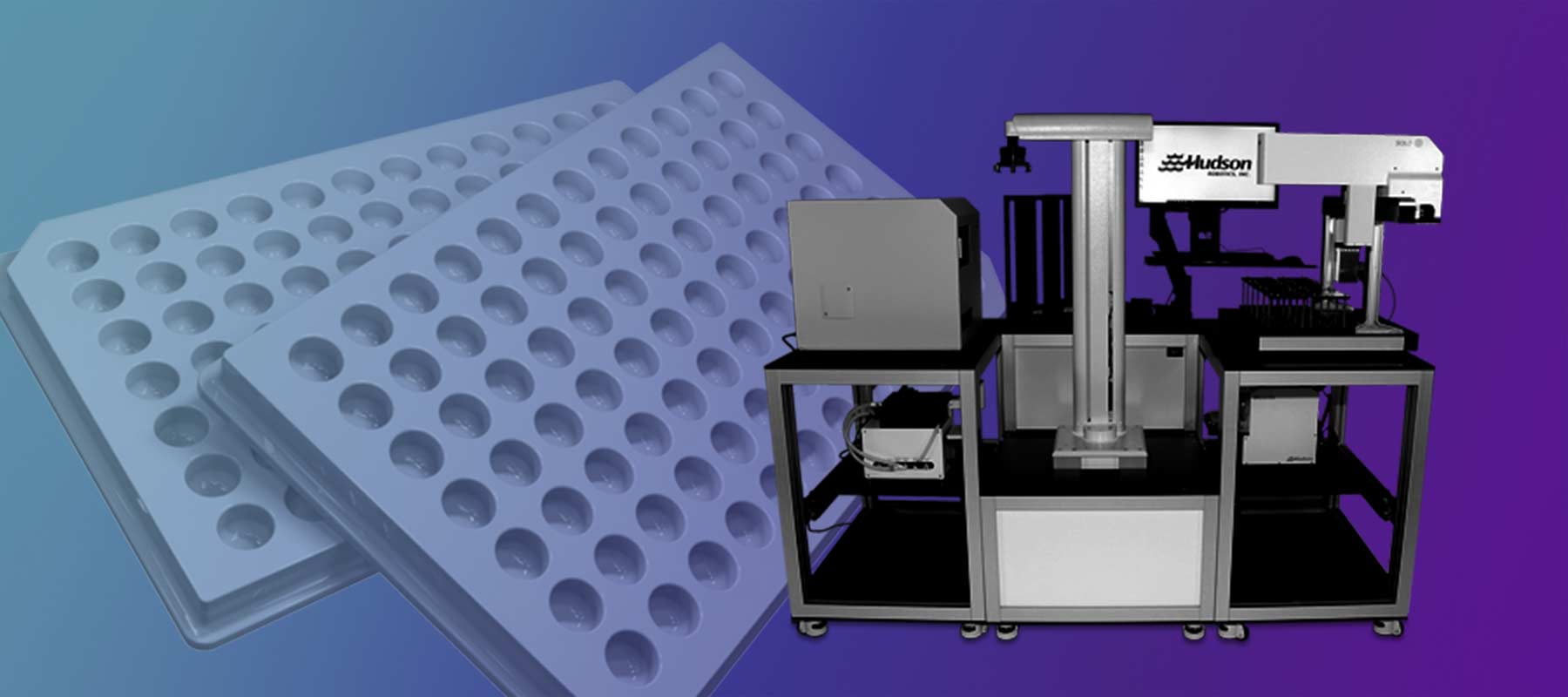 Image of microplates and robots for article on a microplate handling system.